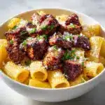 Cajun Steak Tips in Cheesy Rigatoni Parmesan Sauce Recipe