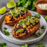 Stuffed Sweet Potato with Avocado, Black Beans & Cilantro Lime Crema