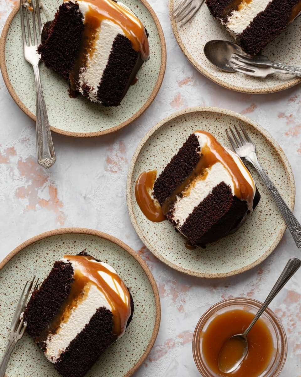 A close-up view of a single slice of dark chocolate cake with a dense, moist texture, sitting on a white plate with some crumbs scattered around. The cake slice has one thick layer of rich dark brown chocolate base, topped with a thick, light beige creamy frosting layer that looks smooth and fluffy. A warm golden caramel sauce is drizzled generously over the top, flowing slightly down the sides of the frosting. The slice is being held by a gold-colored spatula, with another similar cake slice blurred softly in the background, all set on a white marbled surface. Photo taken with an iphone --ar 4:5 --v 7